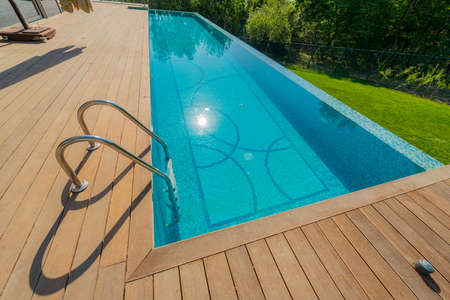 Infinity pool on the bright summer day