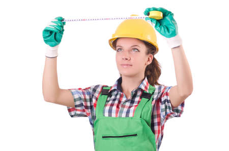 Female workman in green overalls isolated on whiteの写真素材