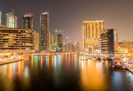 Dubai - AUGUST 9, 2014: Dubai Marina district on August 9 in UAE. Dubai is fastly developing city in Middle Eastのeditorial素材