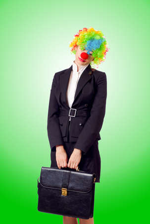 Woman clown in business suitの写真素材