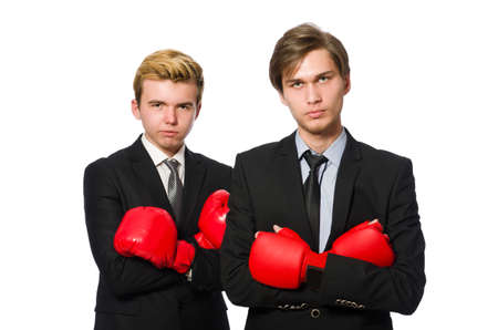 Pair of businessmen boxing on whiteの写真素材