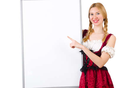 Woman in bavarian costume with poster isolated on whiteの写真素材