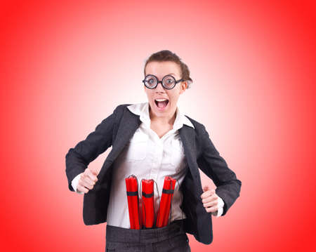 Businesswoman with dynamite against the gradient