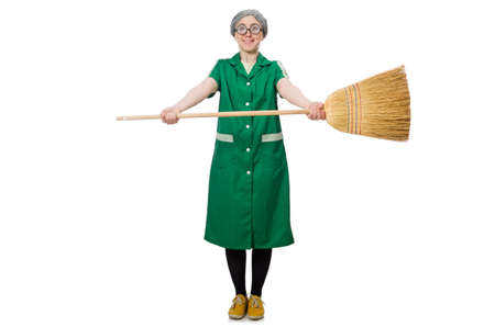 Woman with sweeping brush isolated on whiteの写真素材