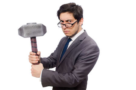 Business man holding hammer isolated on whiteの写真素材
