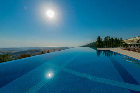 Infinity pool on the bright summer dayの写真素材