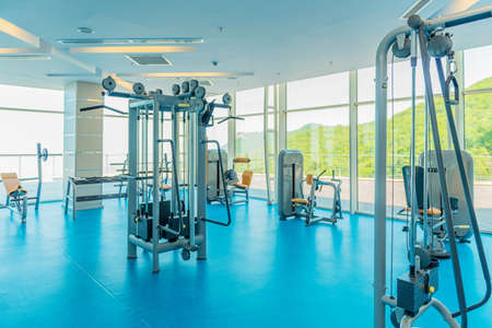 Modern gym with various sports equipmentの写真素材