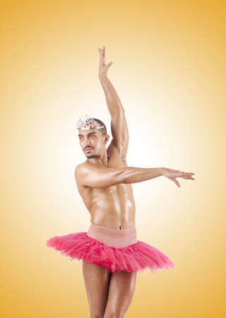 Man in ballet tutu against the gradientの写真素材