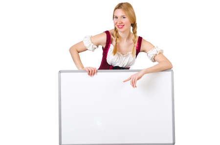 Woman in bavarian costume with poster isolated on whiteの写真素材