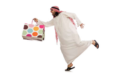 Arab man with shopping bags on whiteの写真素材
