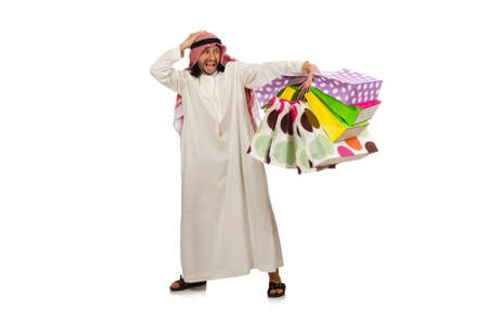 Arab man with shopping bags on whiteの写真素材