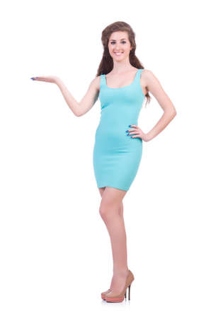 Pretty young girl in blue dress isolated on whiteの写真素材