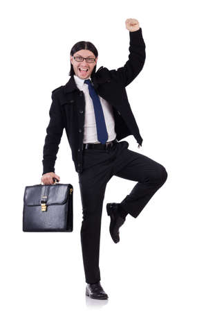 Young businessman holding briefcase isolated on whiteの写真素材