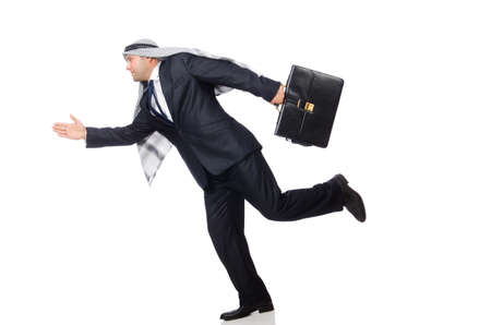 Arab businessman rushing isolated on whiteの写真素材