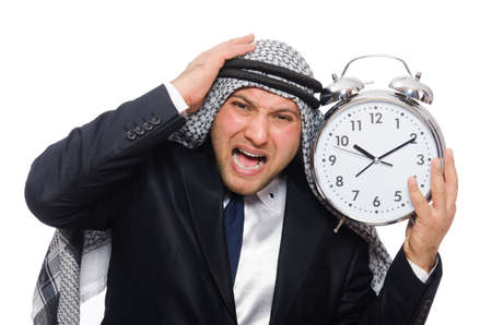 Arab man with clock isolated on whiteの写真素材