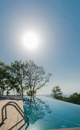 Infinity pool on the bright summer dayの写真素材