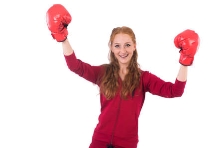 Pretty female sportsman with box gloves isolated on whiteの写真素材
