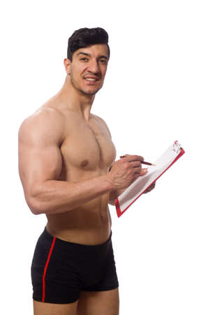 Muscular man with blank pad for your messageの写真素材