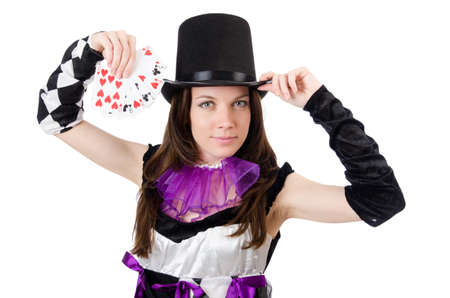 Pretty girl in jester costume with cards isolated on whiteの写真素材