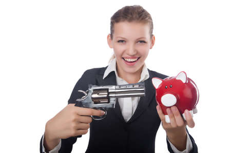 Business lady holding moneybox and gun isolated on whiteの写真素材
