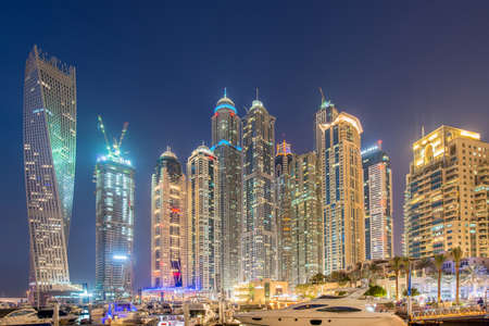 Dubai - JANUARY 10, 2015: Marina district on January 10 in UAE, Dubai. Marina district is popular residential area in Dubaiのeditorial素材