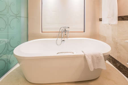 Modern bathroom interior with bathtubの写真素材