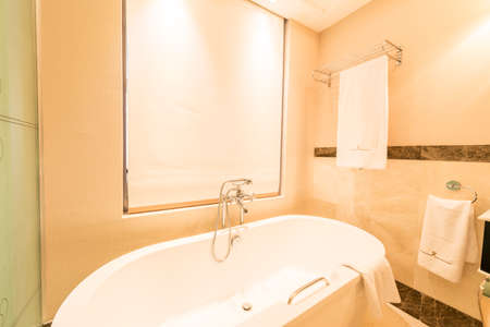 Modern bathroom interior with bathtubの写真素材