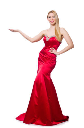 Woman in pretty red evening dress isolated on whiteの写真素材