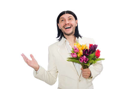 Man with tulip flowers isolated on whiteの写真素材