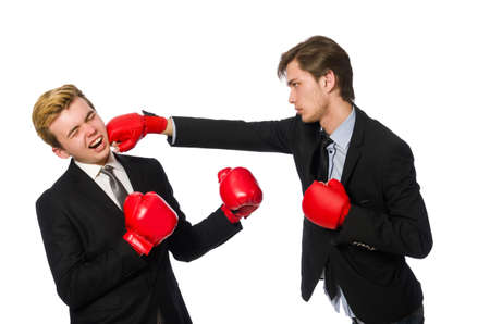Pair of businessmen boxing on whiteの写真素材