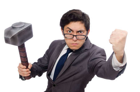 Business man holding hammer isolated on whiteの写真素材