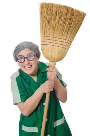 Woman with sweeping brush isolated on whiteの写真素材
