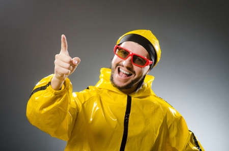 Funny man wearing yellow suit