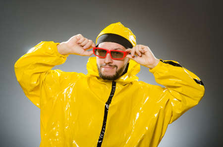 Funny man wearing yellow suitの写真素材