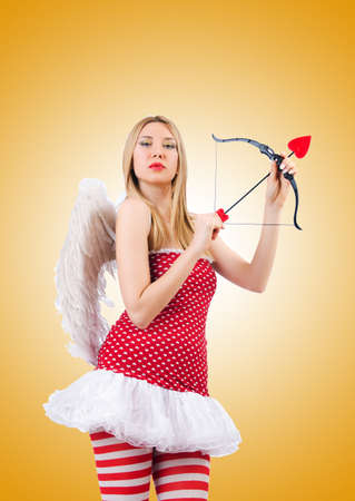 Woman with bow in valentine conceptの写真素材