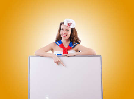 Young woman sailor in marine conceptの写真素材