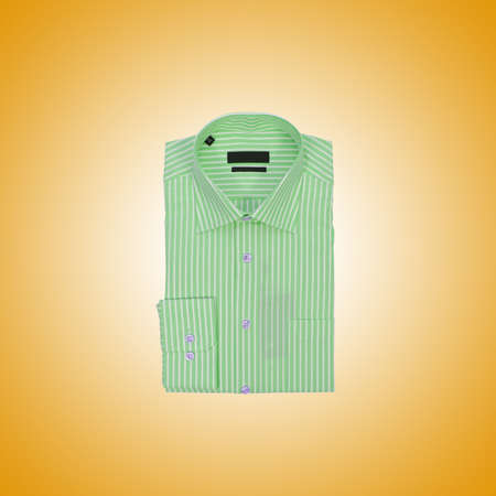 Nice male shirt against the gradientの写真素材