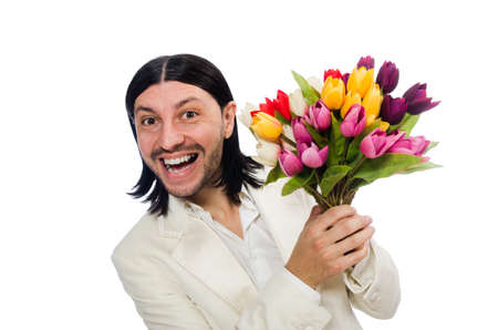 Man with tulip flowers isolated on whiteの写真素材