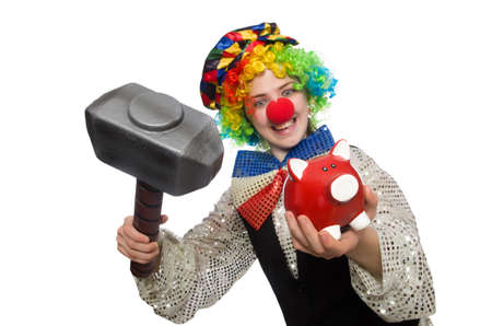 Female clown with hammer and moneybox isolated on whiteの写真素材