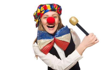 Pretty female clown with maracas isolated on whiteの写真素材
