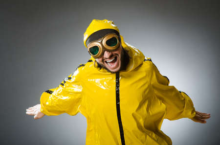 Man wearing yellow suit and aviator glassesの写真素材
