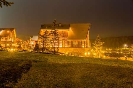 Nice modern house during evening hoursの写真素材