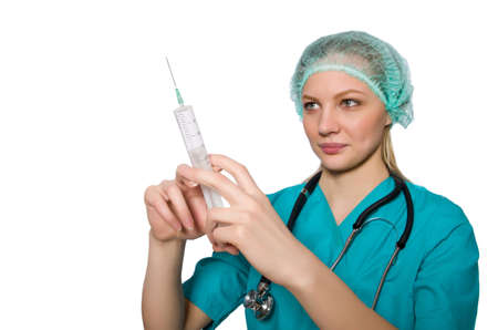 Woman doctor with syringe on whiteの写真素材