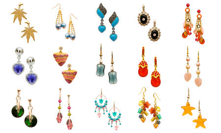 Set of various earrings isolated on whiteの写真素材