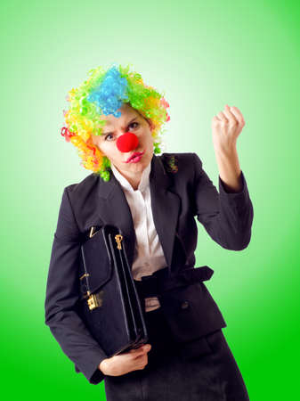 Woman clown in business suitの写真素材