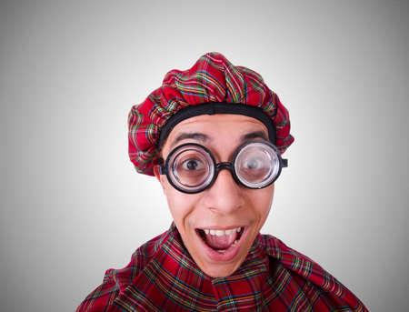 Funny scotsman isolated on the whiteの写真素材