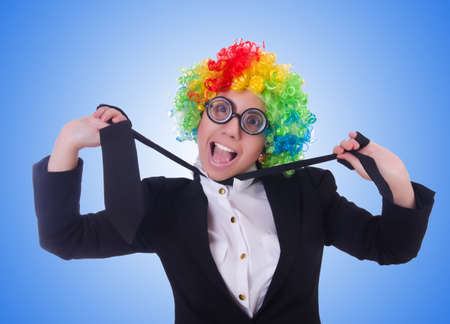 Woman clown businesswoman isolated on whiteの写真素材