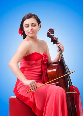 Young girl with violin on whiteの写真素材