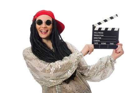 Girl with dreadlocks holding clapperboard isolated on whiteの写真素材