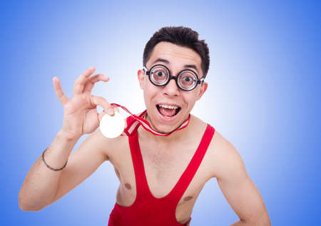 Funny wrestler with winners medalの写真素材